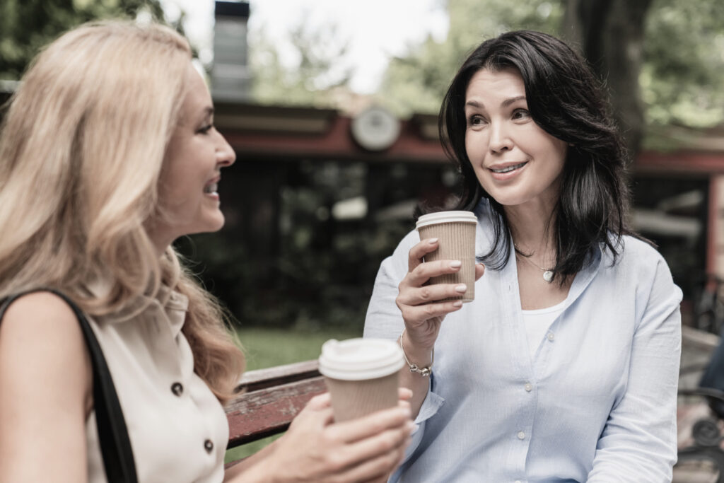 Two friends at an Alumni Program after having completed a Full-Day Treatment Program.