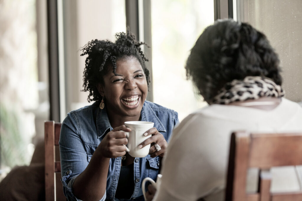 Two friends at an Alumni Program after having completed a Half-Day Treatment Program.