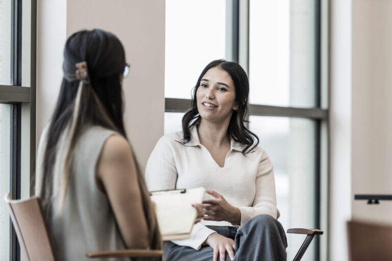 A woman receiving outpatient heroin addiction treatment at Pillars Health Group.