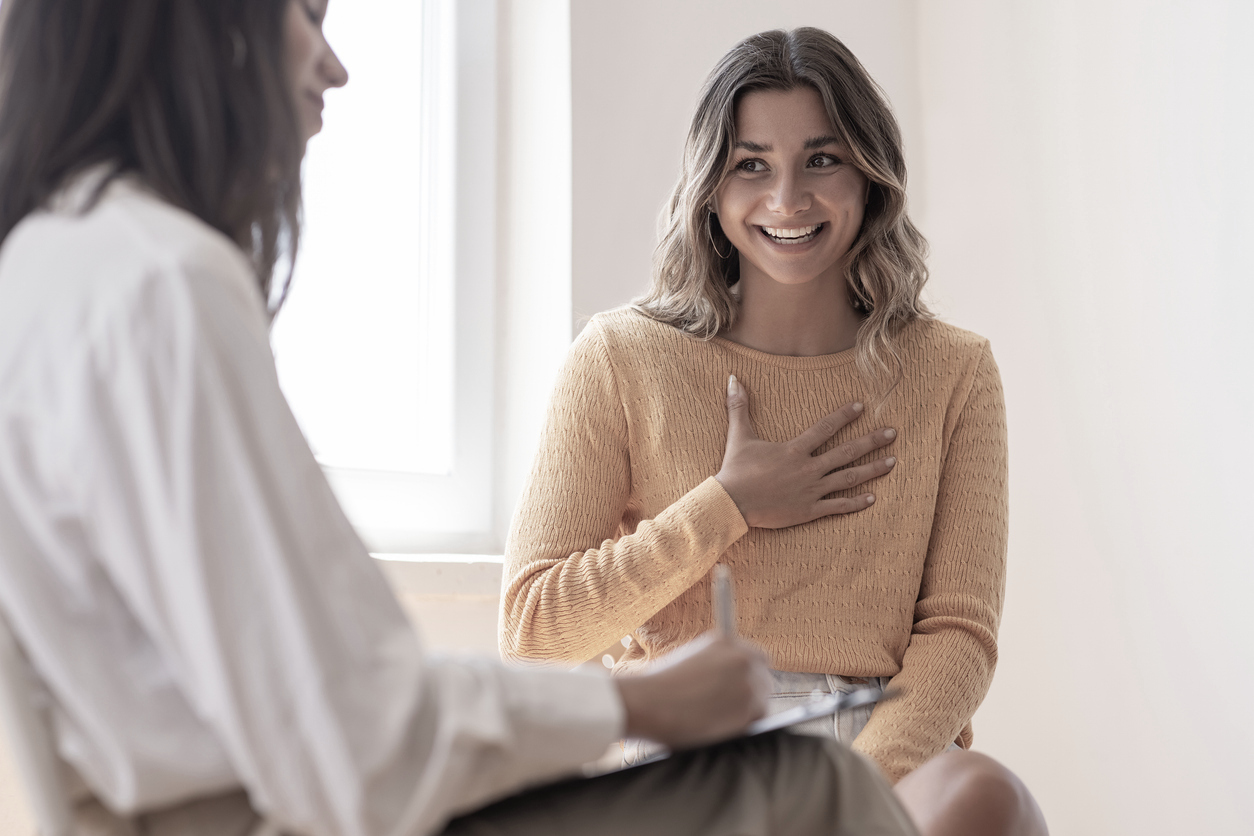 A young woman participating in an outpatient therapy session at Pillars Health Group.