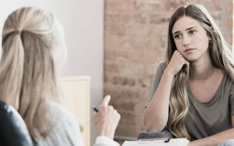 A young woman in full-day teen outpatient treatment session in Concord, MA.