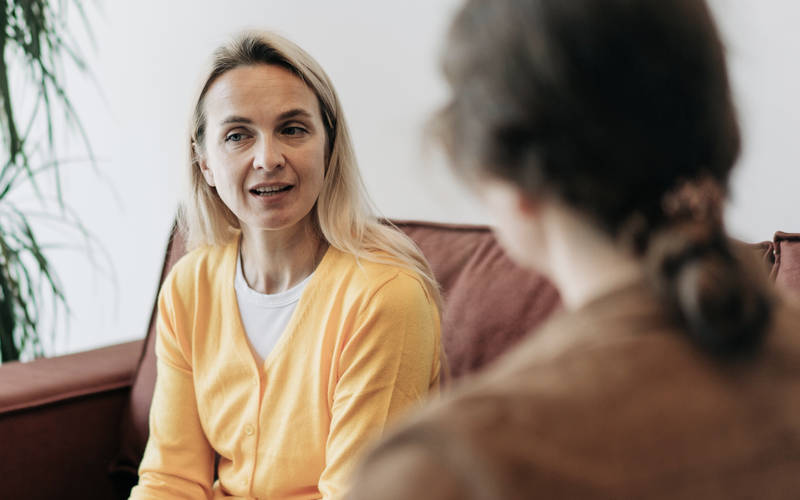 A woman in therapy for mental health treatment in Portland, ME.