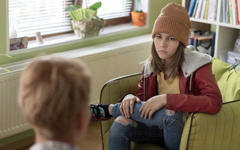A young teen girl in an individual therapy session for outpatient teen depression treatment at Pillars Health Group in Concord, MA.