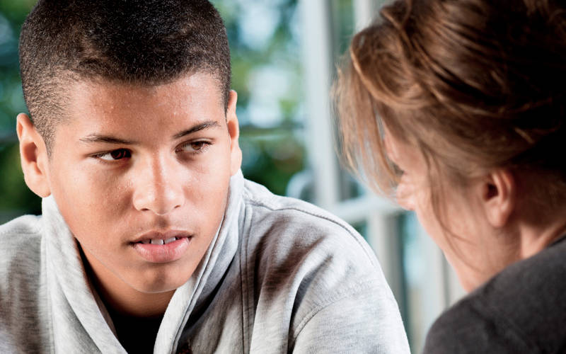 A teen in therapy for attachment-based issues treatment at Pillars Health Group's adolescent treatment center in Concord, MA.