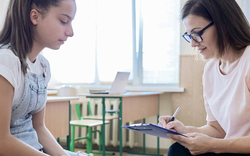 A teenage girl in therapy for teen personality disorder treatment at Pillars Health Group in Concord, MA.
