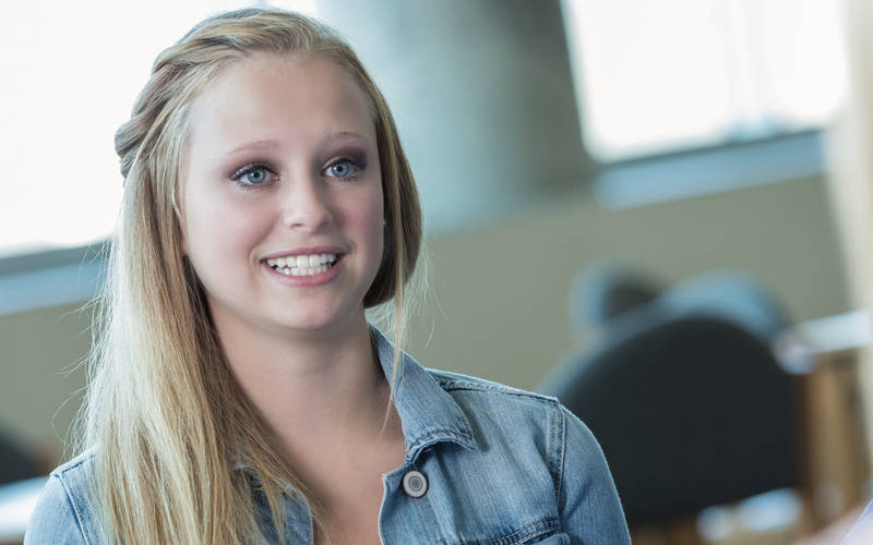 A young girl in individual therapy for teen mood disorder treatment at Pillars Health Group's teen-focused treatment center in Concord, MA.