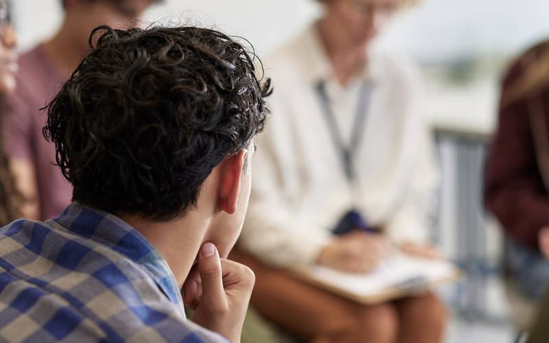 A group of adults in outpatient therapy treatment at Pillars Health Group in South Portland, ME.
