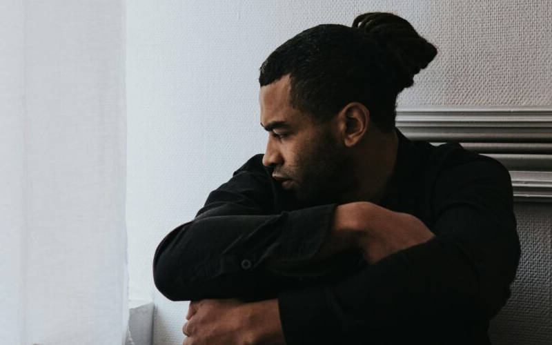 A man learning about how therapy can help manage dissociative disorders.