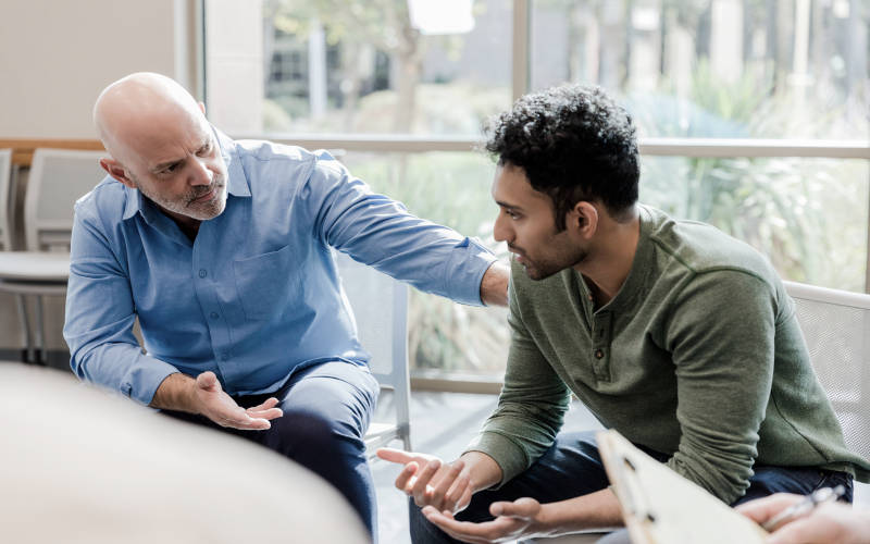 A young man getting outpatient mental health and addiction treatment at Pillars Health Group in Tewksbury, Massachusetts.