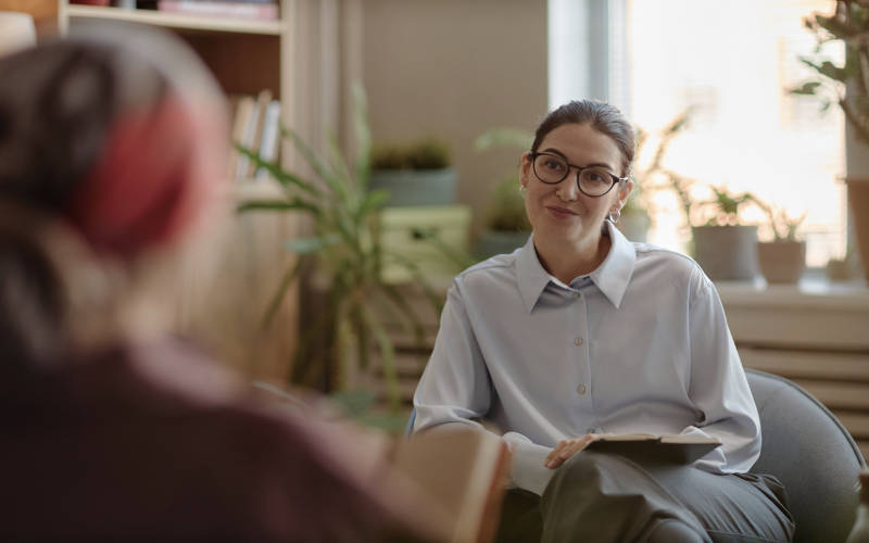 A young woman in therapy for addiction and mental health treatment in Lexington, Massachusetts.