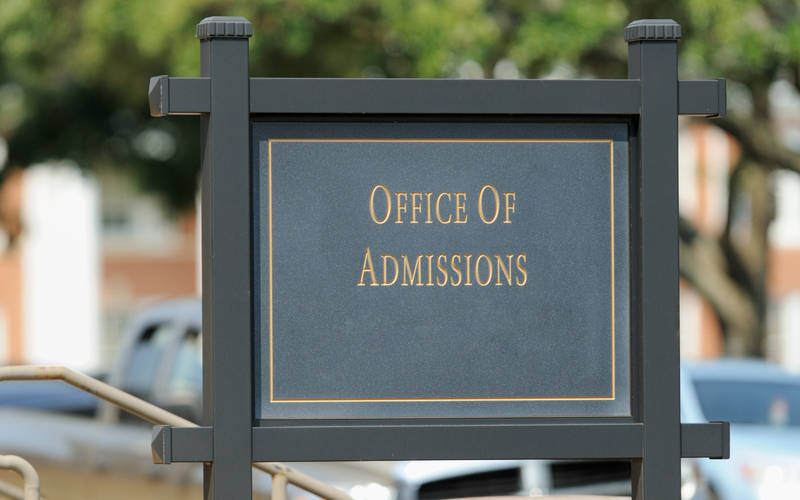 An image outside of a college for an article about teen college admissions anxiety.