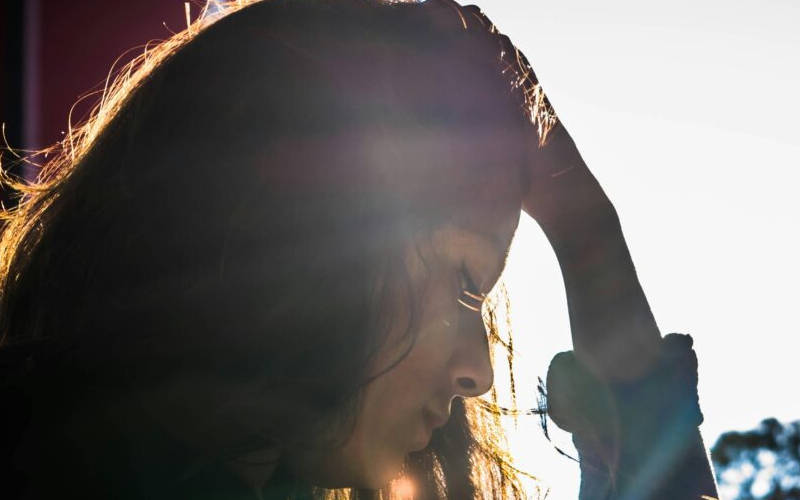 A woman understanding mixed anxiety depressive disorder symptoms, and treatment options.