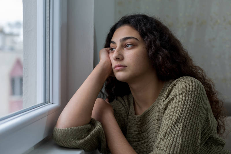 A young woman dealing with teen grief.