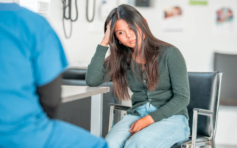 A teen girl experiencing teen mood swings.