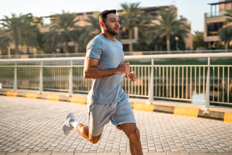 A man on a healthy run after detox and addiction treatment.