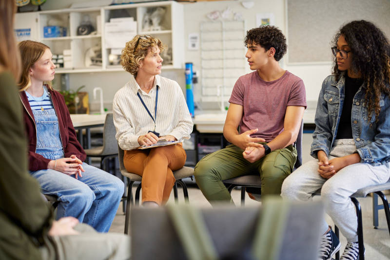 A group therapy session of teens going through exposure therapy.