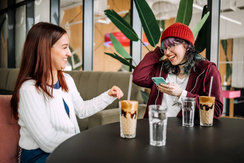 Two teenage girls with varying levels of attachment-based issues, getting coffee.