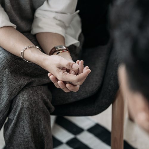 A person in therapy at Pillars Health Group.