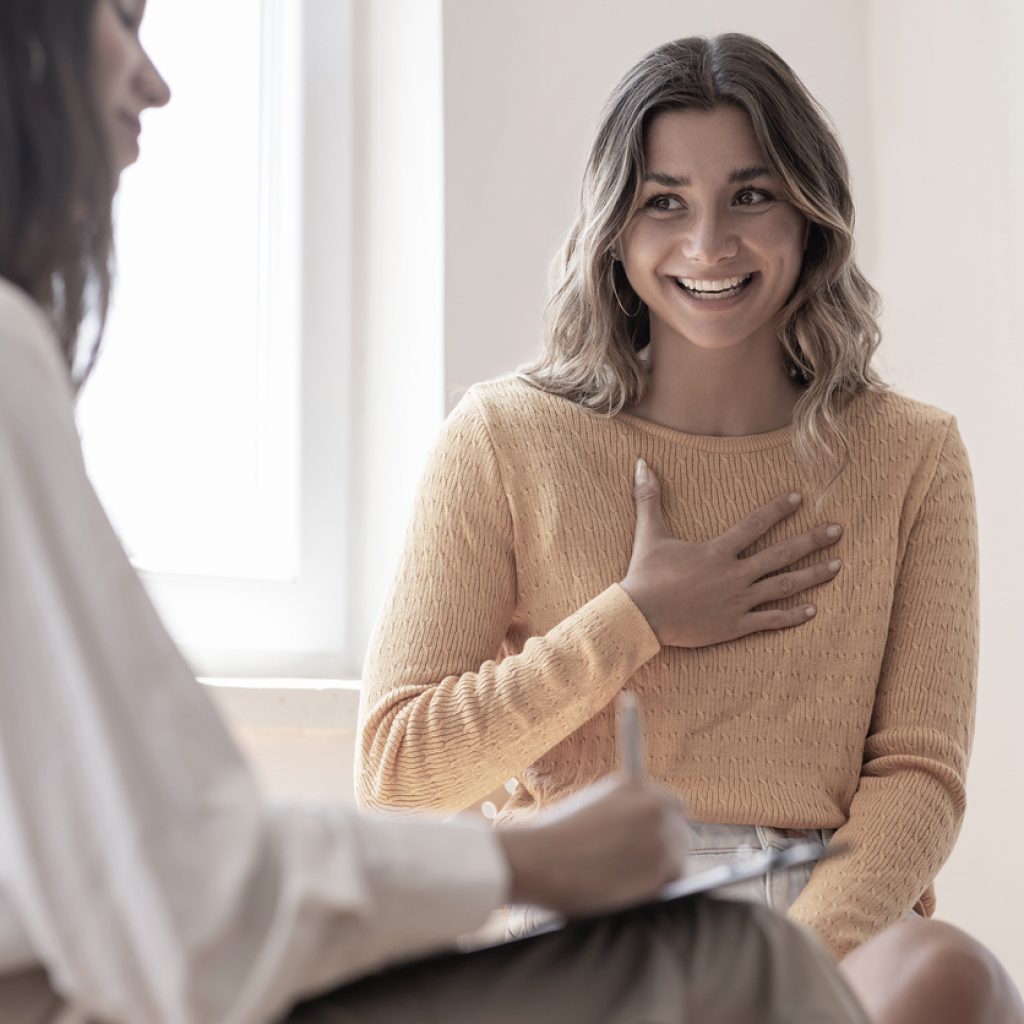 A young woman participating in an outpatient therapy session at Pillars Health Group.
